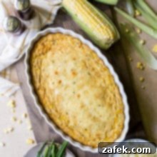 Overhead photo of Cheesy Corn Casserole with a few ears of corn