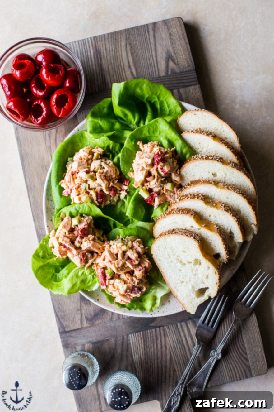 Mediterranean Peppadew and Olive Chicken Salad 2 Overhead photo of chicken salad with peppadews and olives in lettuce cups