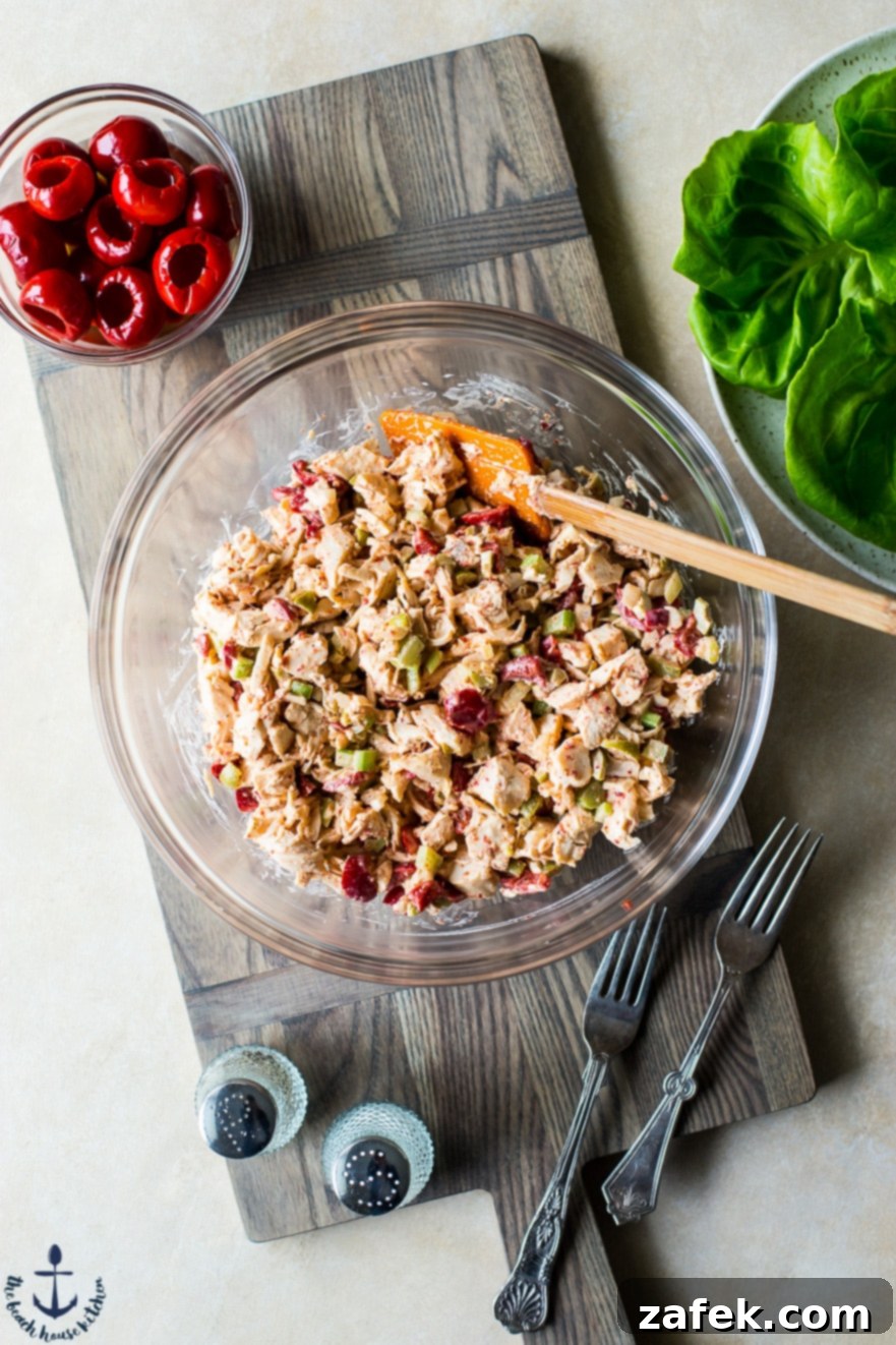 Mediterranean Peppadew and Olive Chicken Salad 7 Chicken salad with peppadews and olives in glass bowl