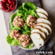 Mediterranean Peppadew and Olive Chicken Salad 8 Overhead photo of chicken salad with peppadews and olives in lettuce cups