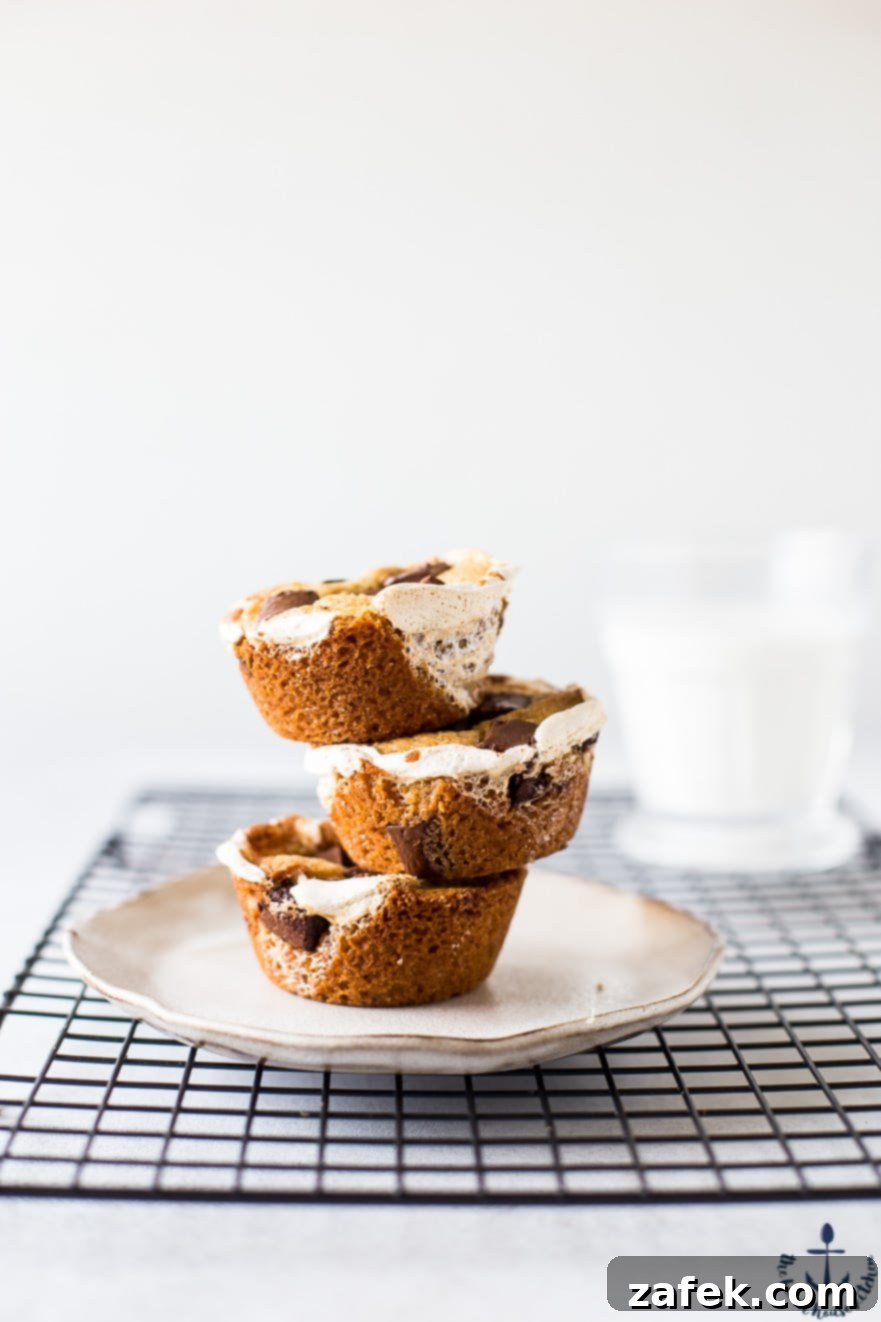 Stack of S'mores Cups on a plate, showcasing melted chocolate and marshmallow