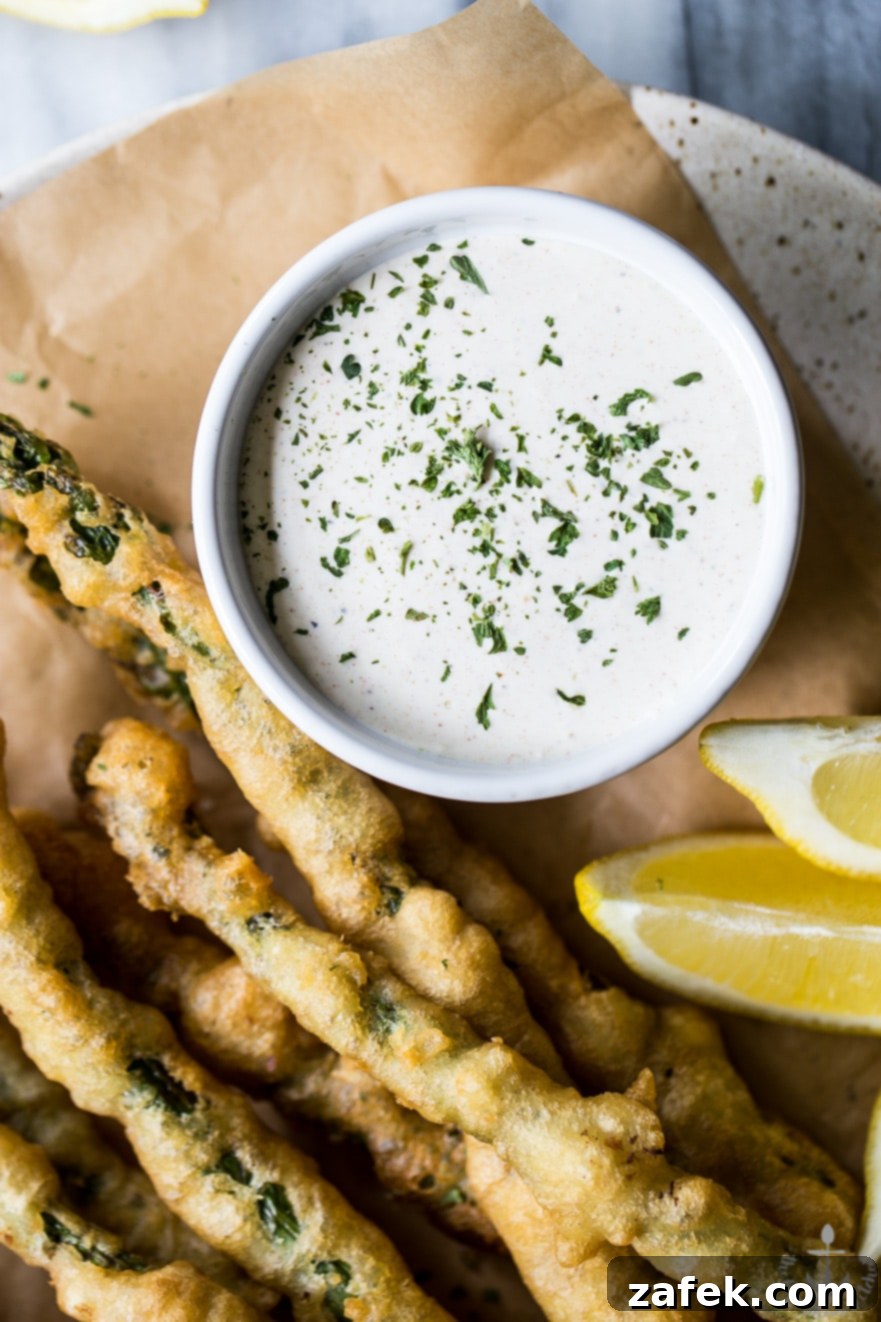 Overhead photo of horseradish cream sauce in a white bowl