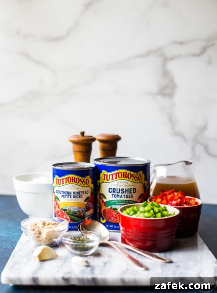 Ingredients for stuffed pepper soup on a marble board