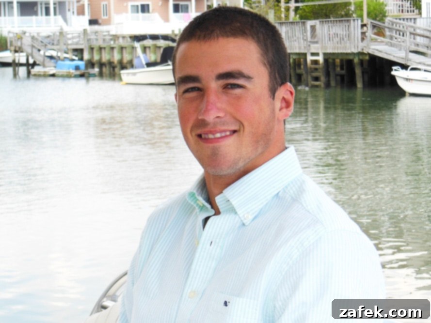 The Charleston Sparkle 3 A proud parent making a toast with a Charleston Fizz, celebrating a son's graduation.