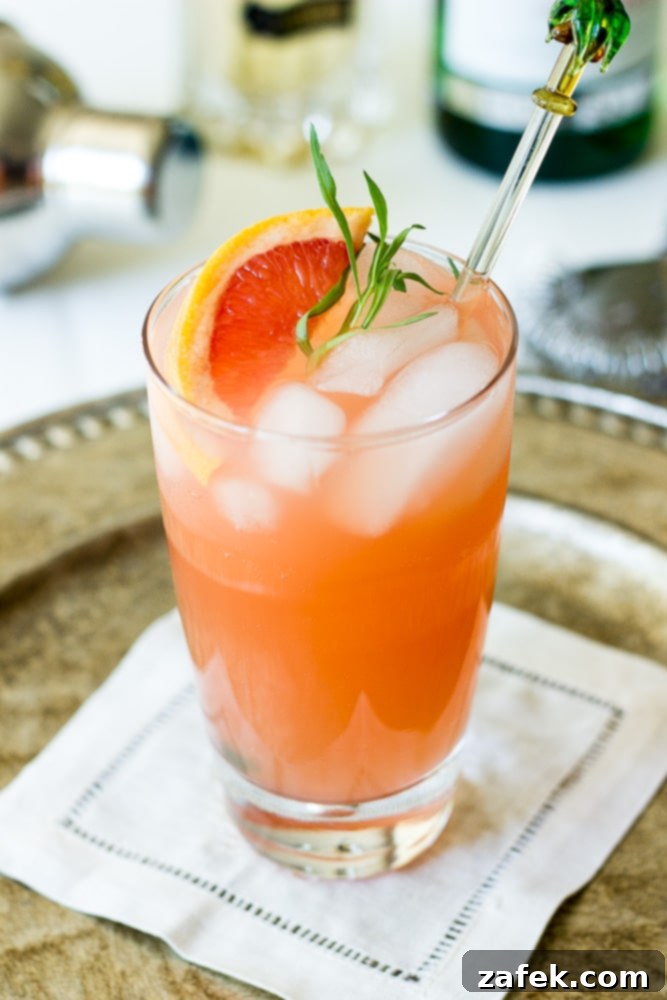 The Charleston Sparkle 4 Assortment of fresh ingredients for Charleston Fizz, including grapefruit and tarragon.