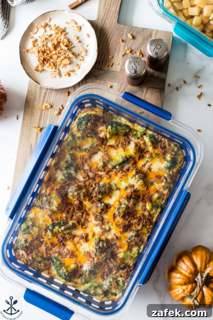 Effortless Festive Broccoli Bake 3 Overhead photo of easy holiday broccoli casserole on a wooden board