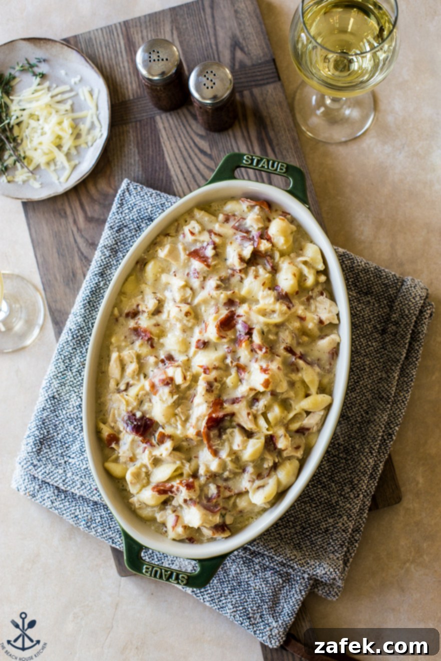 Creamy Cordon Bleu Chicken Pasta Bake 5 Another overhead view of the finished chicken cordon bleu pasta bake, emphasizing its rich texture and appealing presentation.
