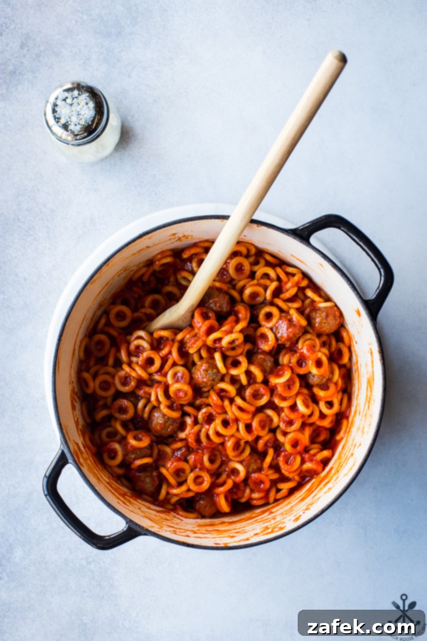Overhead photo of a pot filled with homemade SpaghettiO's ready to serve