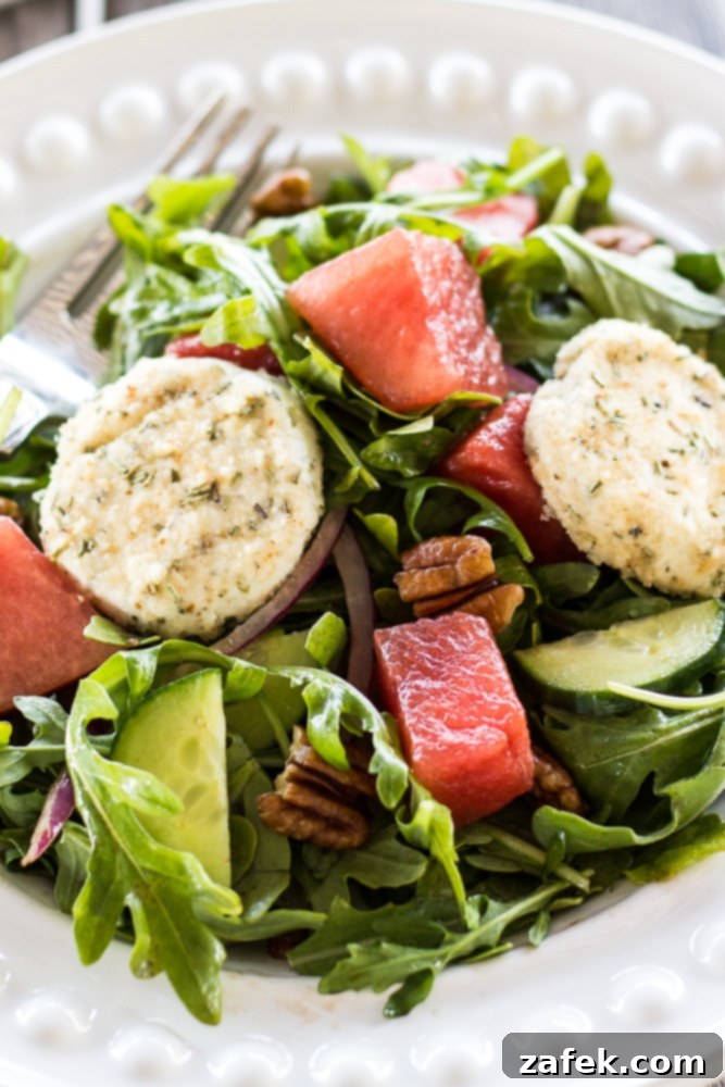 Fresh ingredients for Watermelon Salad with Arugula & Baked Goat Cheese
