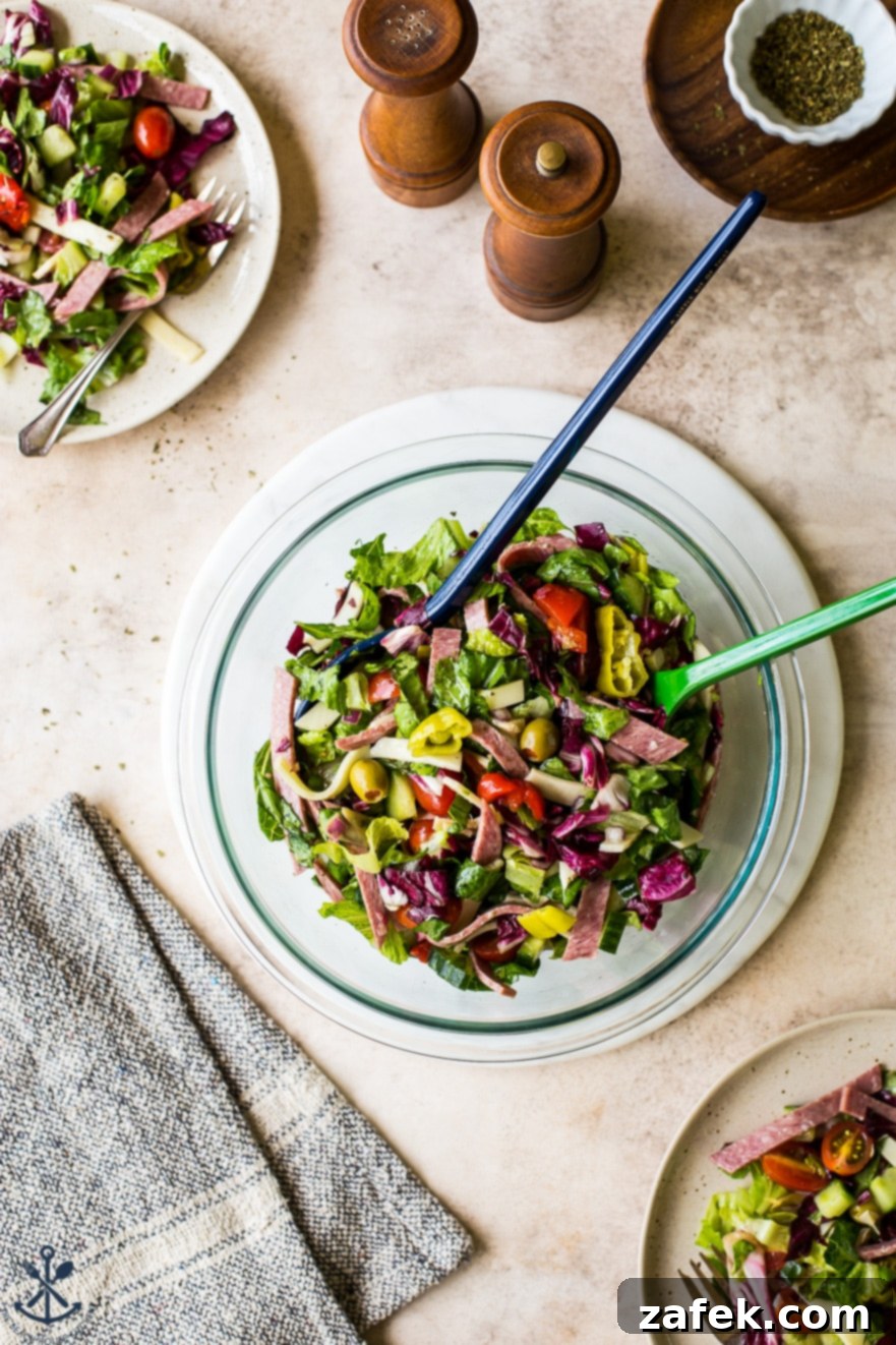 Close-up of fresh, colorful Italian Chopped Salad ingredients being prepared for mixing