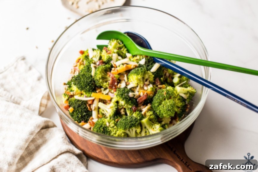 Classic Broccoli Salad with Bacon served in an elegant glass bowl, ready to be enjoyed