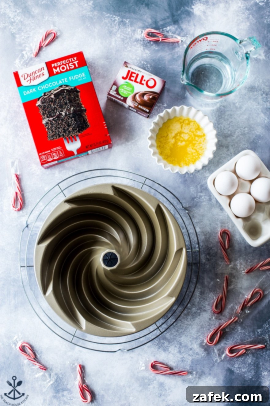 Peppermint Kissed Double Chocolate Decadence 5 Overhead photo of ingredients for bundt cake with bundt pan on a marble board