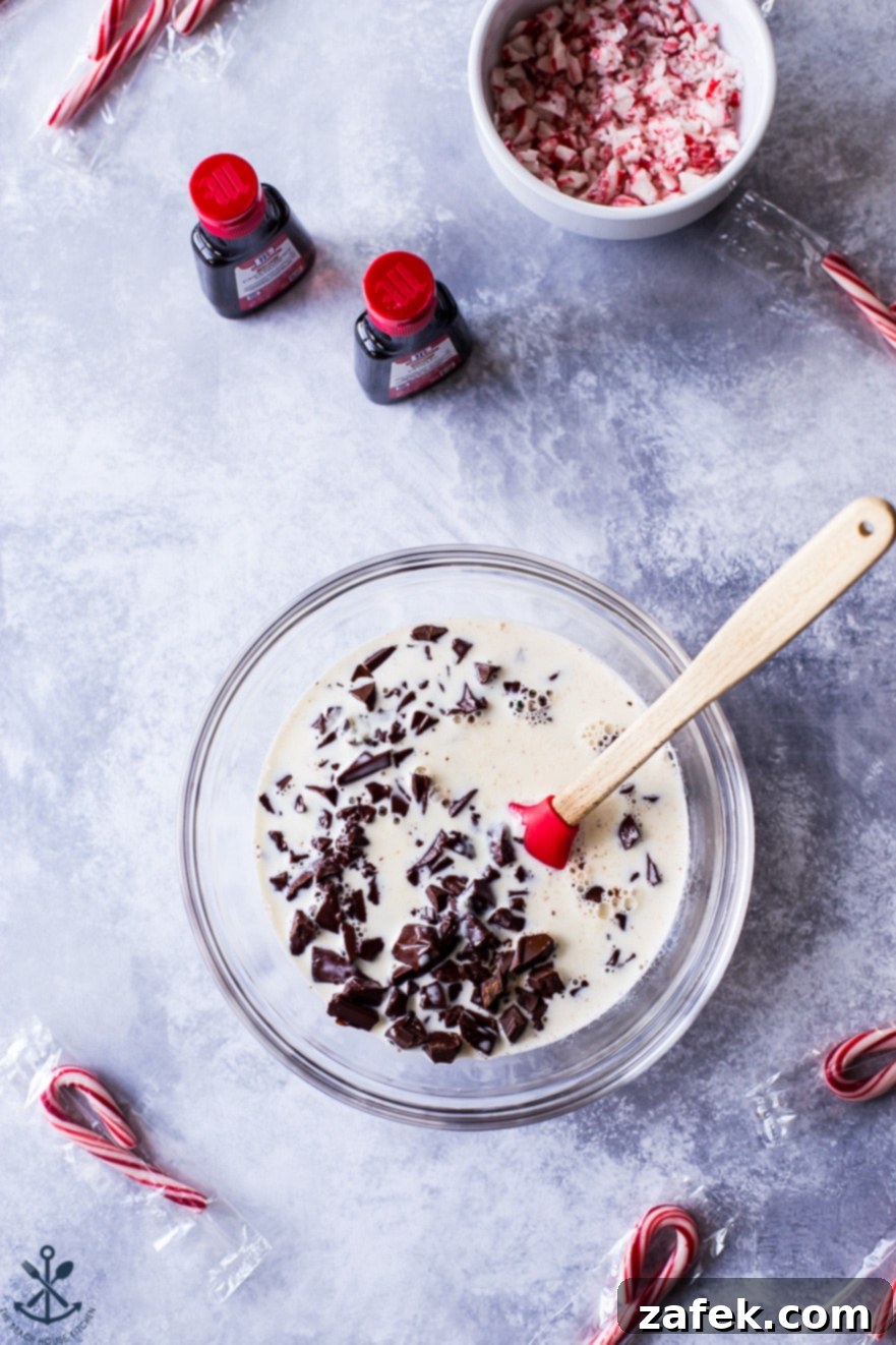 Peppermint Kissed Double Chocolate Decadence 8 Ingredients for chocolate ganache in a bowl with a spatula