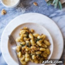 Sage-Kissed Gnocchi with Toasted Walnut Brown Butter 7 Gnocchi with Walnut Brown Butter Sage Sauce plated