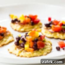 Crispy Corn Fritters with Zesty Black Bean Salsa 2 Corn Fritters with Garden Black Bean Salsa