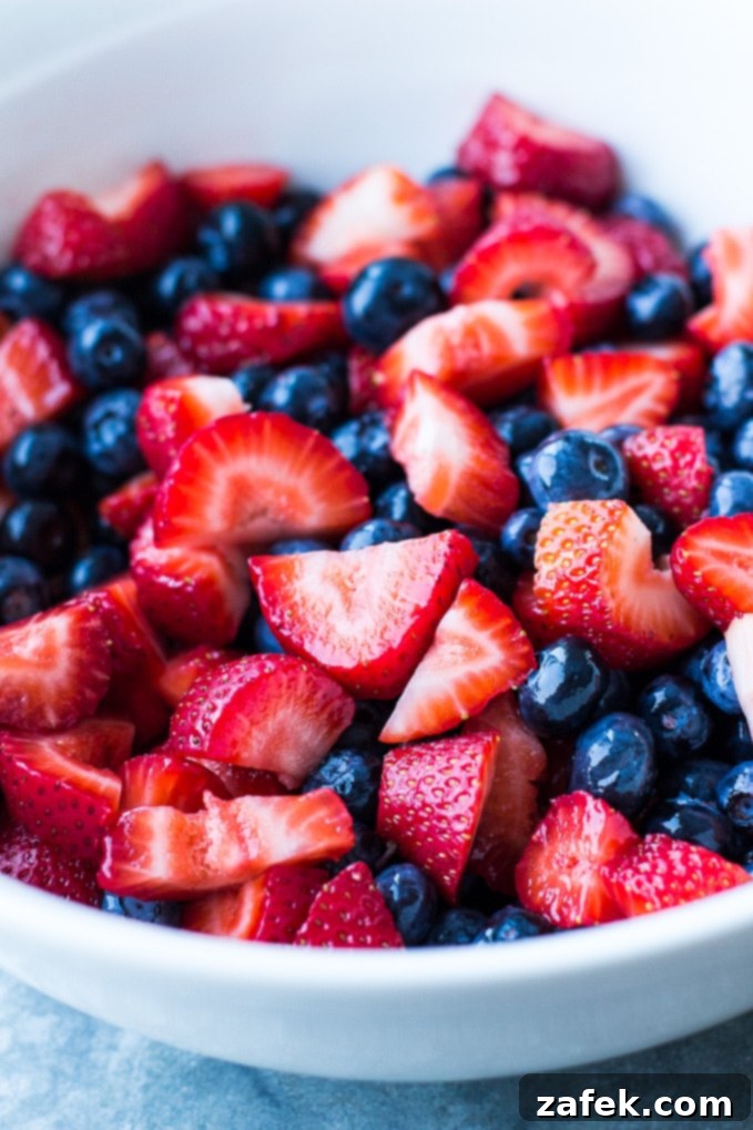 Delicious Berry Cobbler with Sweet Biscuit Topping, perfect for summer gatherings