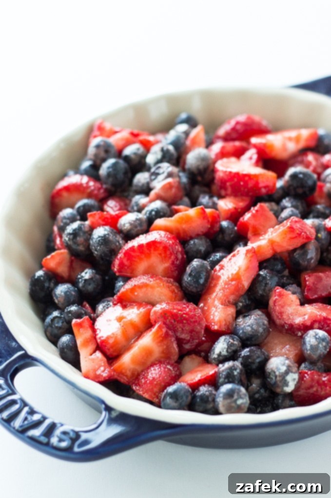 Freshly baked Berry Cobbler, a vibrant blend of strawberries and blueberries