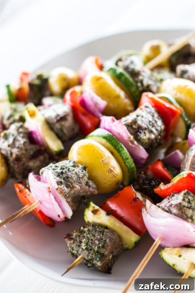 Juicy Grilled Herbed Steak Skewers with Fresh Chimichurri Drizzle