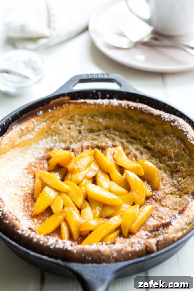 Golden Caramelized Peach Dutch Baby 2 Dutch Baby with Caramelized Peaches