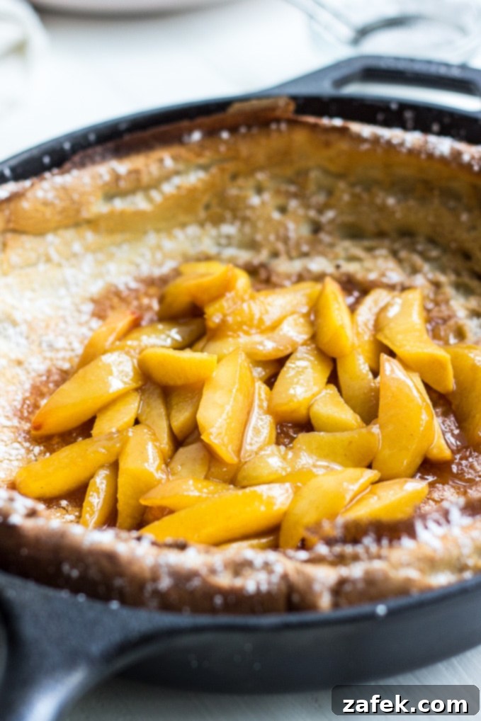 Golden Caramelized Peach Dutch Baby 5 Dutch Baby with Caramelized Peaches