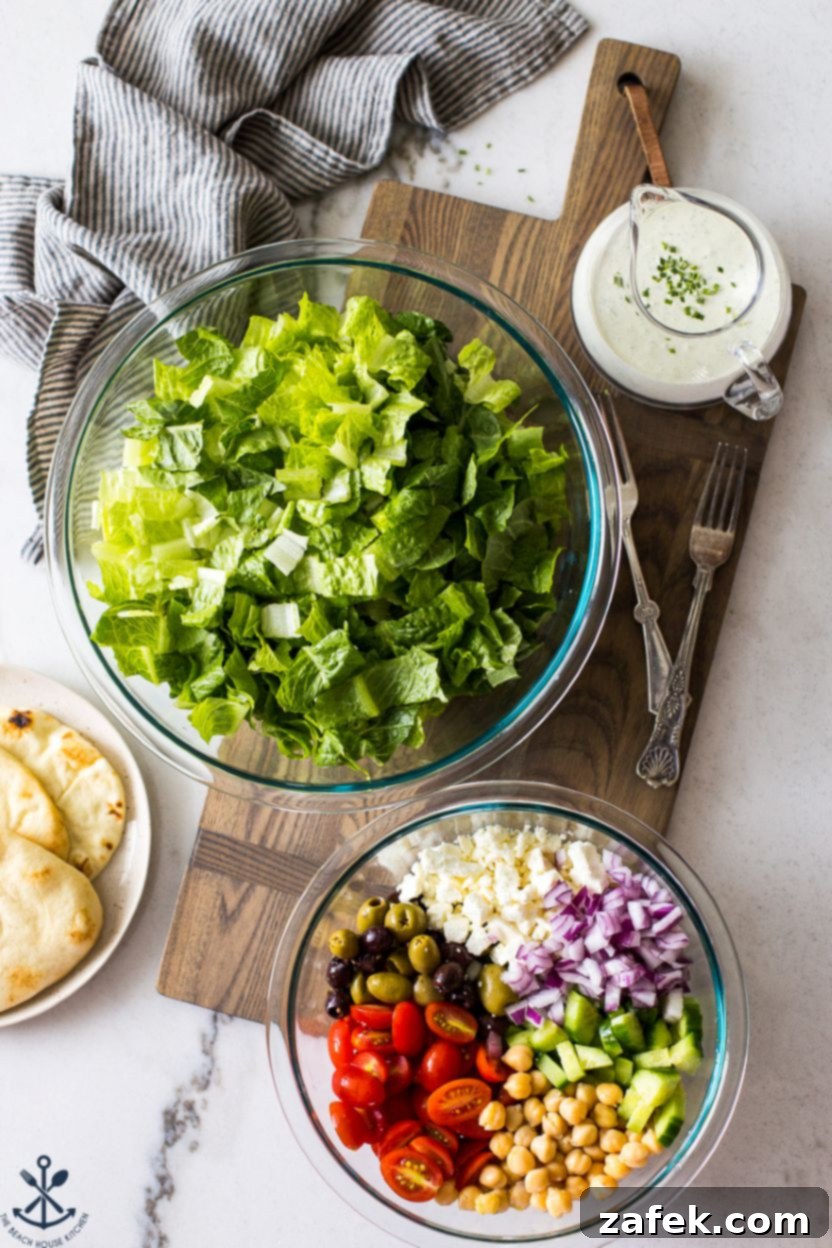 Zesty Green Goddess Greek Chickpea Salad 4 Overhead photo of ingredients for a Greek Chickpea Salad with Green Goddess Dressing