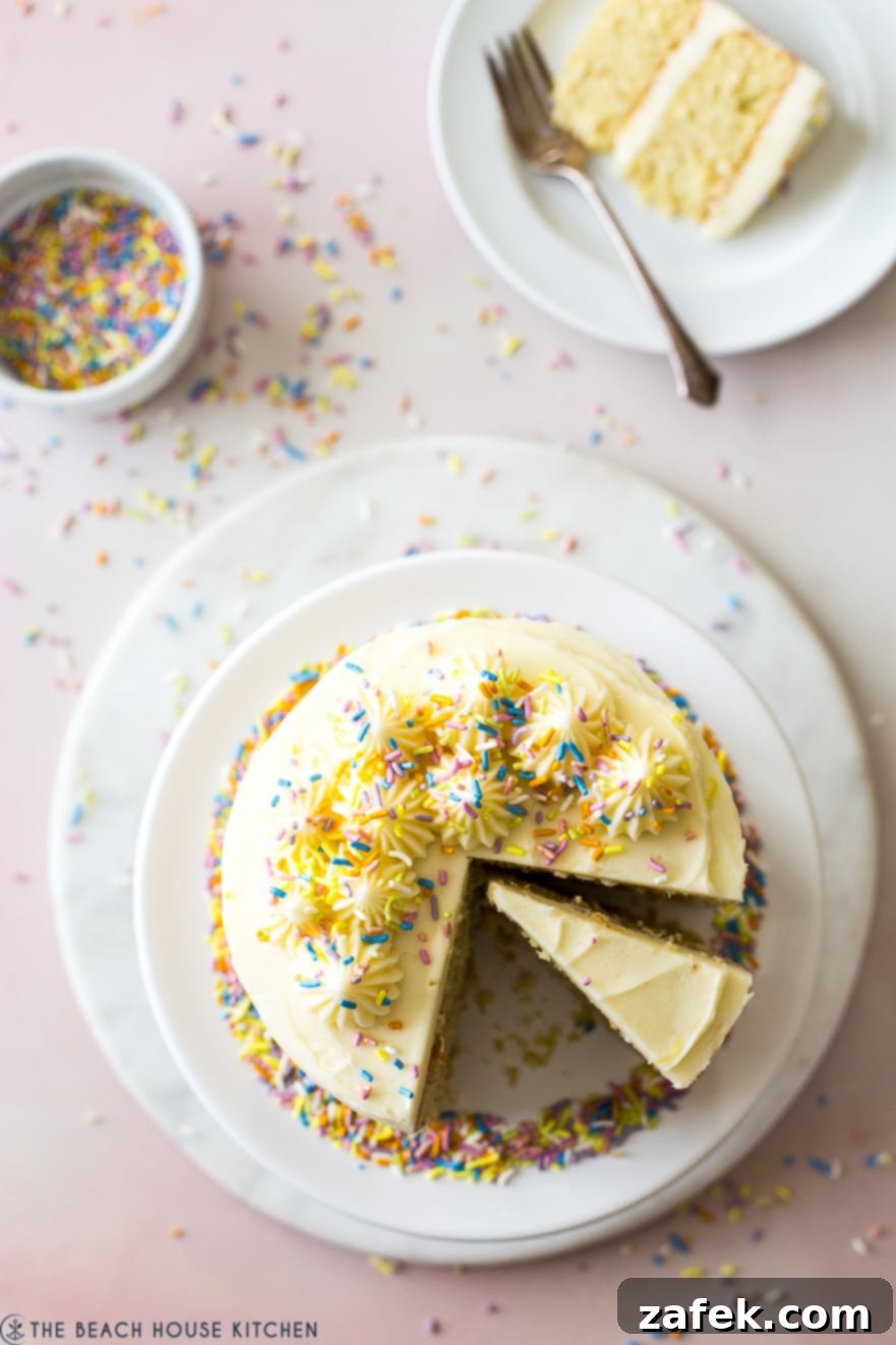Full overhead view of a beautifully frosted Lemon Layer Cake