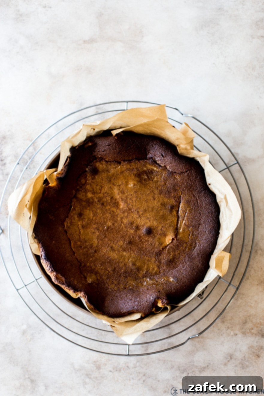 San Sebastian Burnt Cheesecake 8 An overhead photo of an unmolded burnt cheesecake on a wire rack