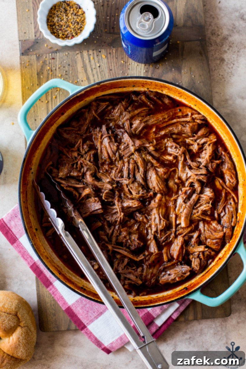 Overhead photo of Beer-Braised BBQ Chuck Roast in a skillet