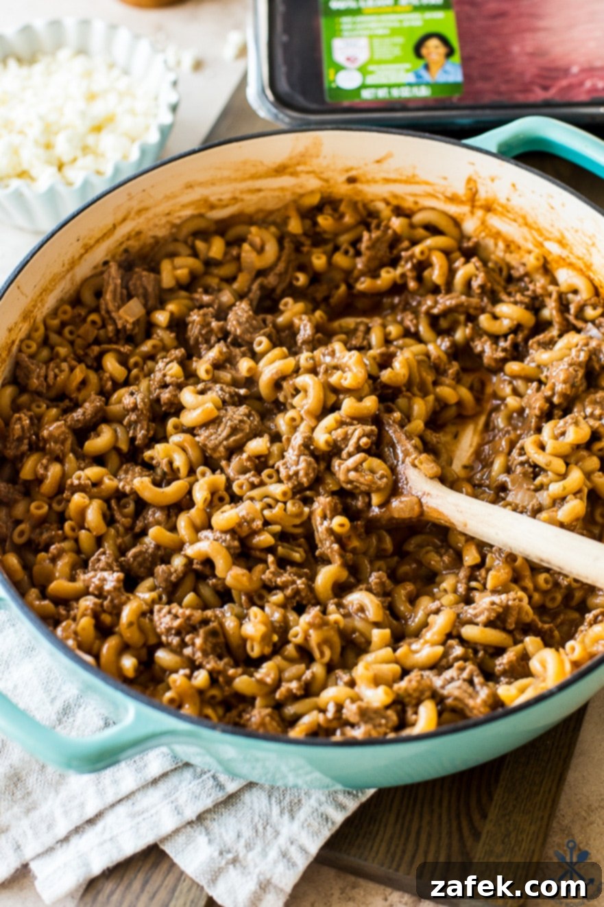 Homemade Greek Beef and Orzo Skillet 3 Up close photo of a beef and pasta skillet dish