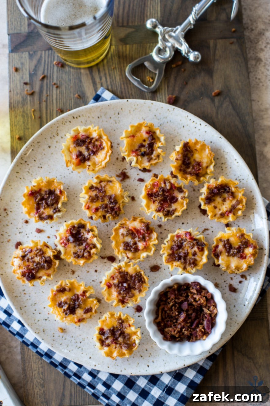 Bacon Pimento Cheese Poppers 2 Overhead photo of phyllo tarts filled with pimento cheese and topped with bacon