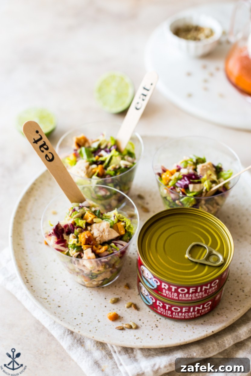 Detailed view of the ingredients for Thai Chili Mango Tuna Chopped Salad on a plate, highlighting texture and freshness.