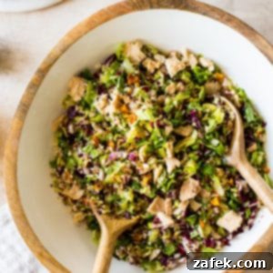 Overhead view of the complete Thai Chili Mango Tuna Chopped Salad with a focus on its colorful presentation.