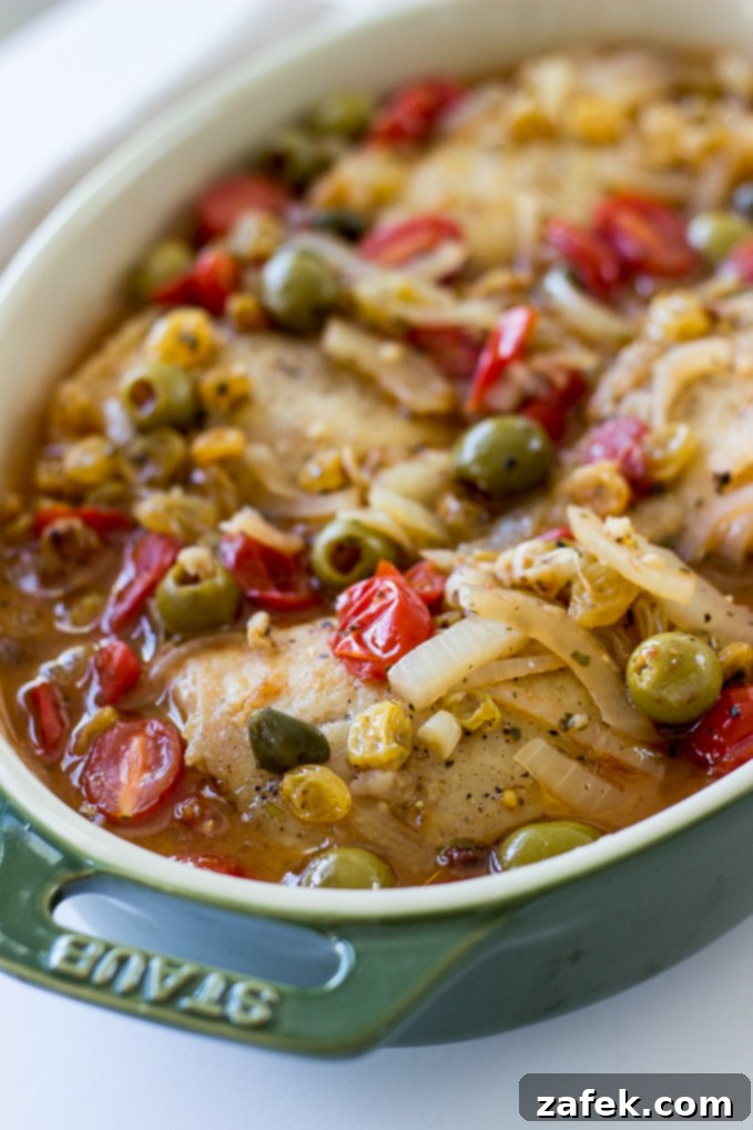 Zesty Mediterranean Chicken with Tomatoes, Olives and Capers 4 Plated Mediterranean Chicken with sauce