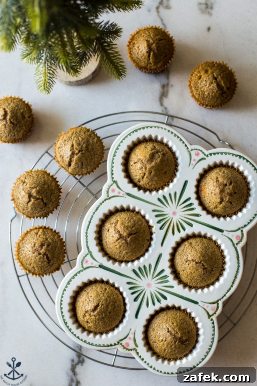 Overhead photo of chai cupcakes without frosting in a decorative muffin baking dish