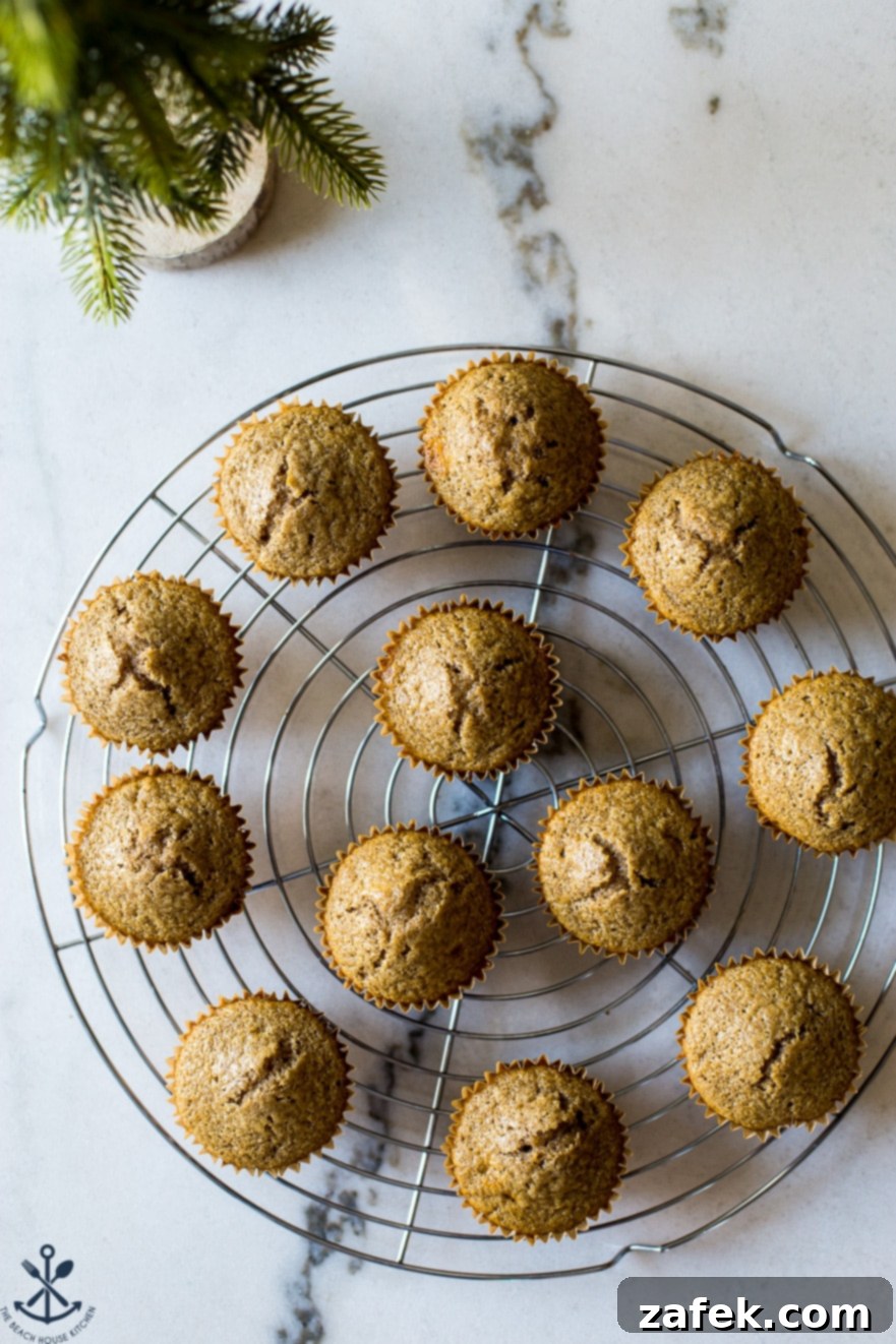 Overhead photo of a round baking rack of pre-frosted chai cupcakes