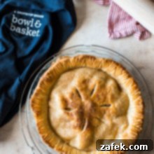 ShopRite's Holiday Apple Pie Fest 8 Overhead photo of an apple pie with a blue apron off to the side