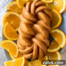 Orange Buttermilk Loaf Cake on a plate