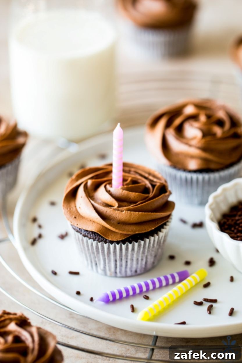 Decadent Double Chocolate Delights 3 Close-up of a double chocolate cupcake, showcasing its moist texture