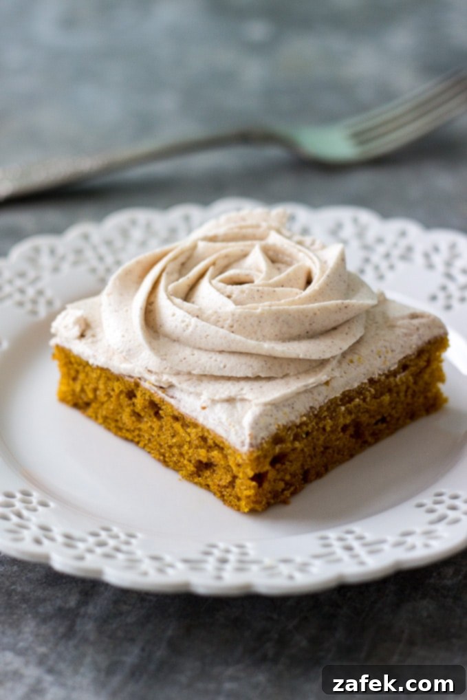 Deliciously moist Pumpkin Squares with elegant Cinnamon Vanilla Buttercream frosting, ready for a fall celebration