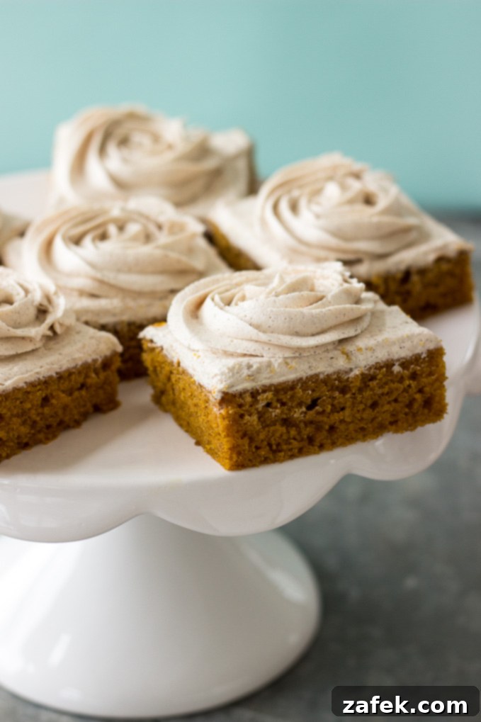 Artfully decorated Pumpkin Squares featuring beautiful piped buttercream roses