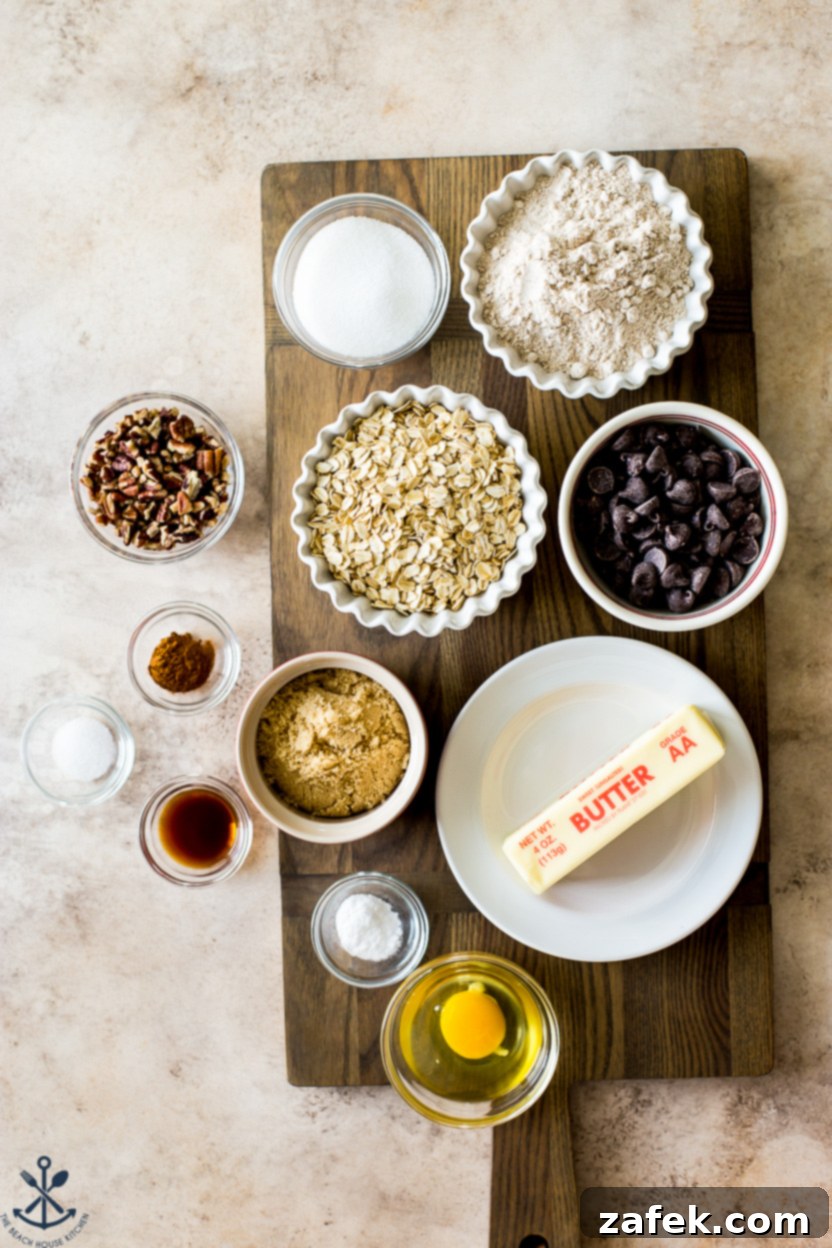 Chewy Oatmeal Chocolate Chip Bars 4 Overhead photo of ingredients laid out in separate bowls for making oatmeal chocolate chip bars