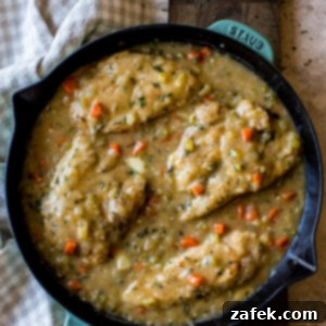 Garlic Chicken Delight 8 Smothered Garlic Chicken ready to be served, showing the tender chicken and rich gravy