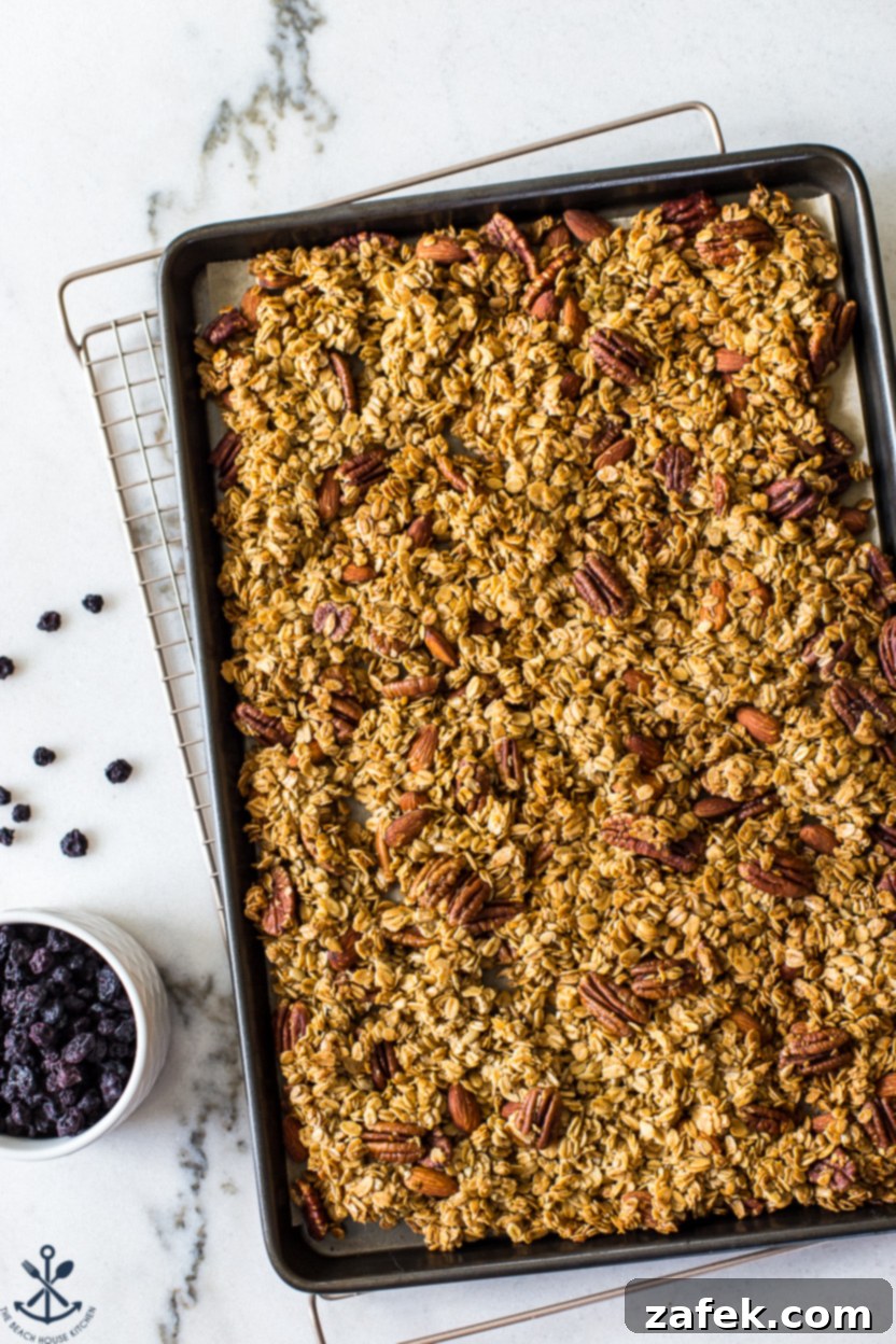 Sunshine Lemon Berry Crunch 8 Overhead photo of a sheet pan of baked granola