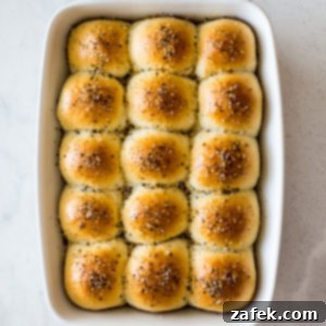 Overhead photo of a baking dish of Soft Everything Dinner Rolls