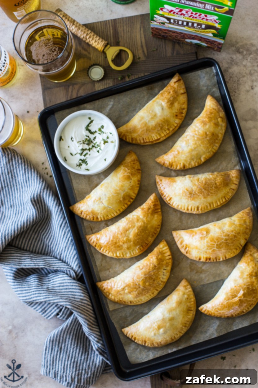 Spicy Cheesy Empanadas 8 Another close-up of baked Chili Cheese Empanadas, showcasing their golden crust and savory filling.