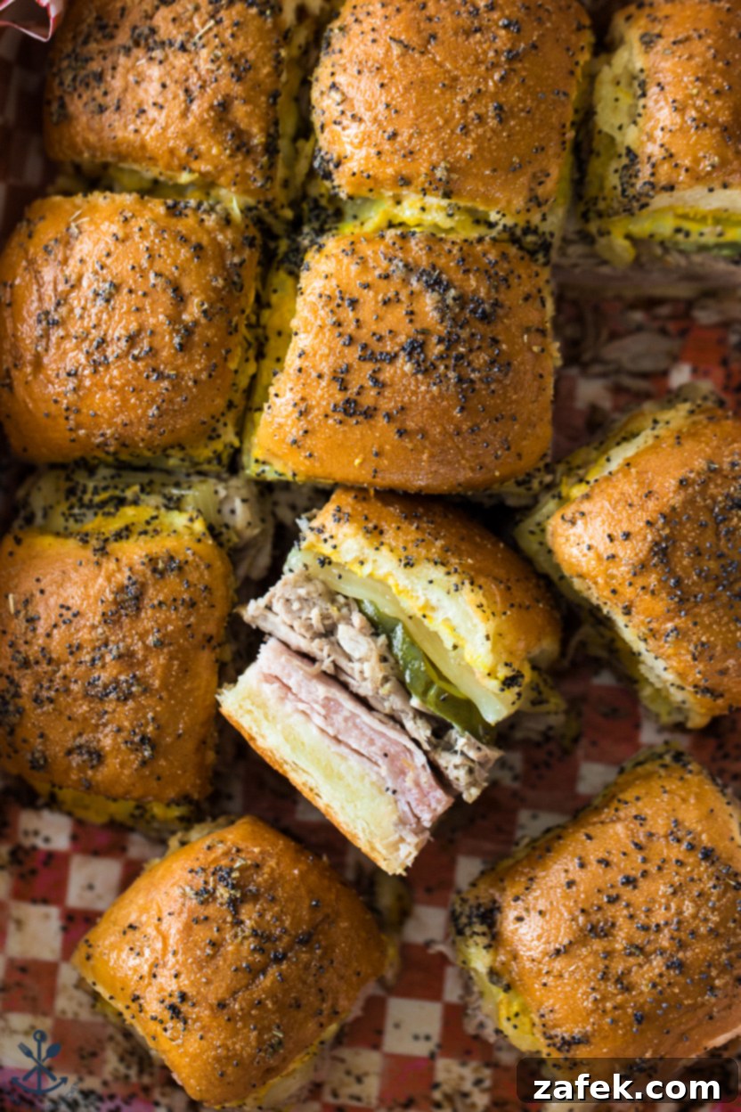 Savory Cuban Mini Sandwiches 3 Up close overhead photo of Cuban slider sammies, showing the layers of ingredients.