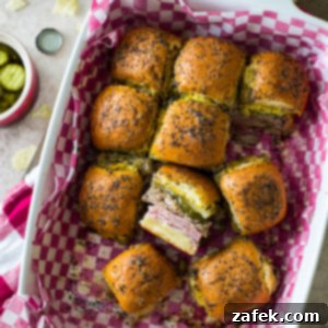 Savory Cuban Mini Sandwiches 7 Close-up of a Cuban Slider, showcasing the delicious filling and golden bun.