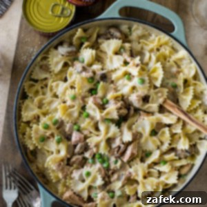 Savory Tuna Pasta with Earthy Mushrooms and Sweet Peas 6 Overhead photo of a skillet of pasta with peas mushrooms and tuna