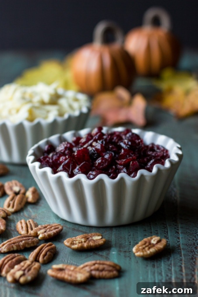 Close-up of a Brown Butter Cranberry White Chocolate Pecan Blondie
