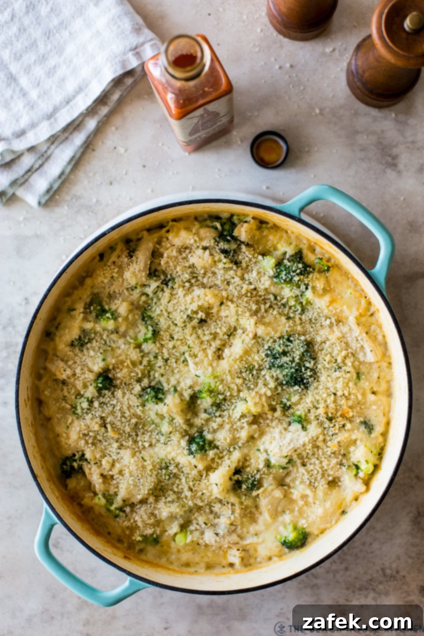 Creamy Chicken and Broccoli Rice Casserole 3 Overhead photo of a cheesy chicken broccoli rice bake dish